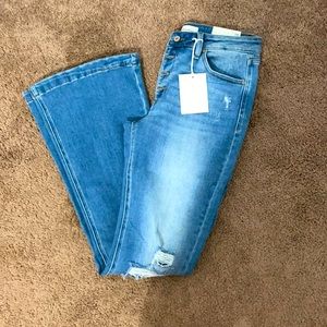 Distressed bell bottom Kancan jeans